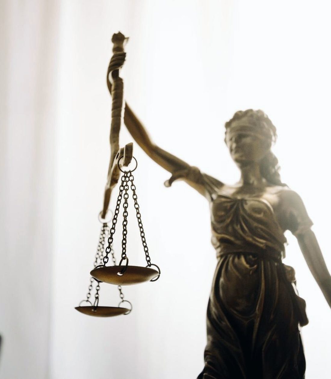 Statue of Lady Justice holding the scales